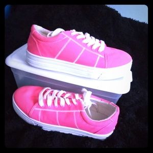 Neon pink shoes
